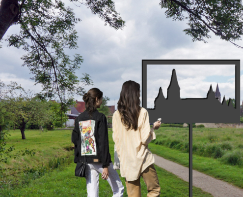 Mise en perspective de la silhouette de l’ancienne abbaye dans le paysage du bourg