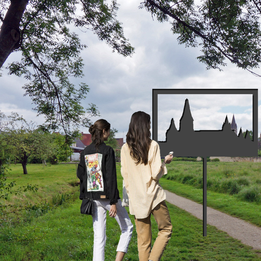 Mise en perspective de la silhouette de l’ancienne abbaye dans le paysage du bourg